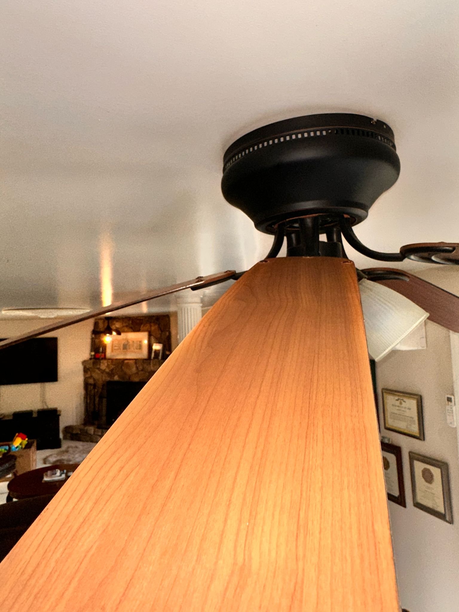 Ceiling fan blade wiped clean of dust during a Dyment Cleaning Service visit